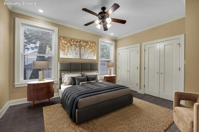 a bedroom with bed and a window