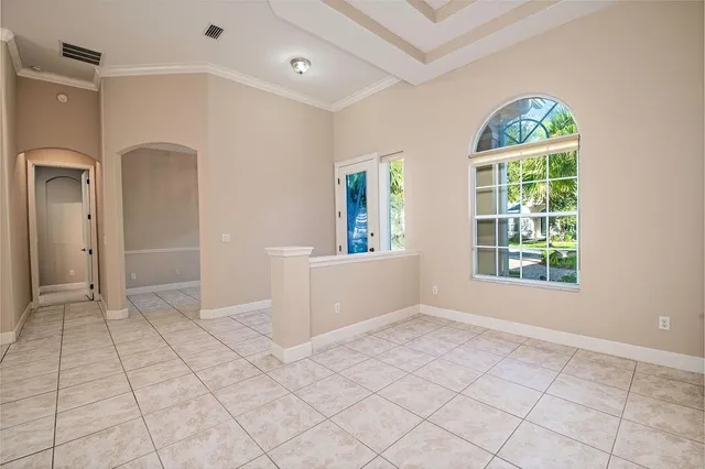 a view of an empty room and window