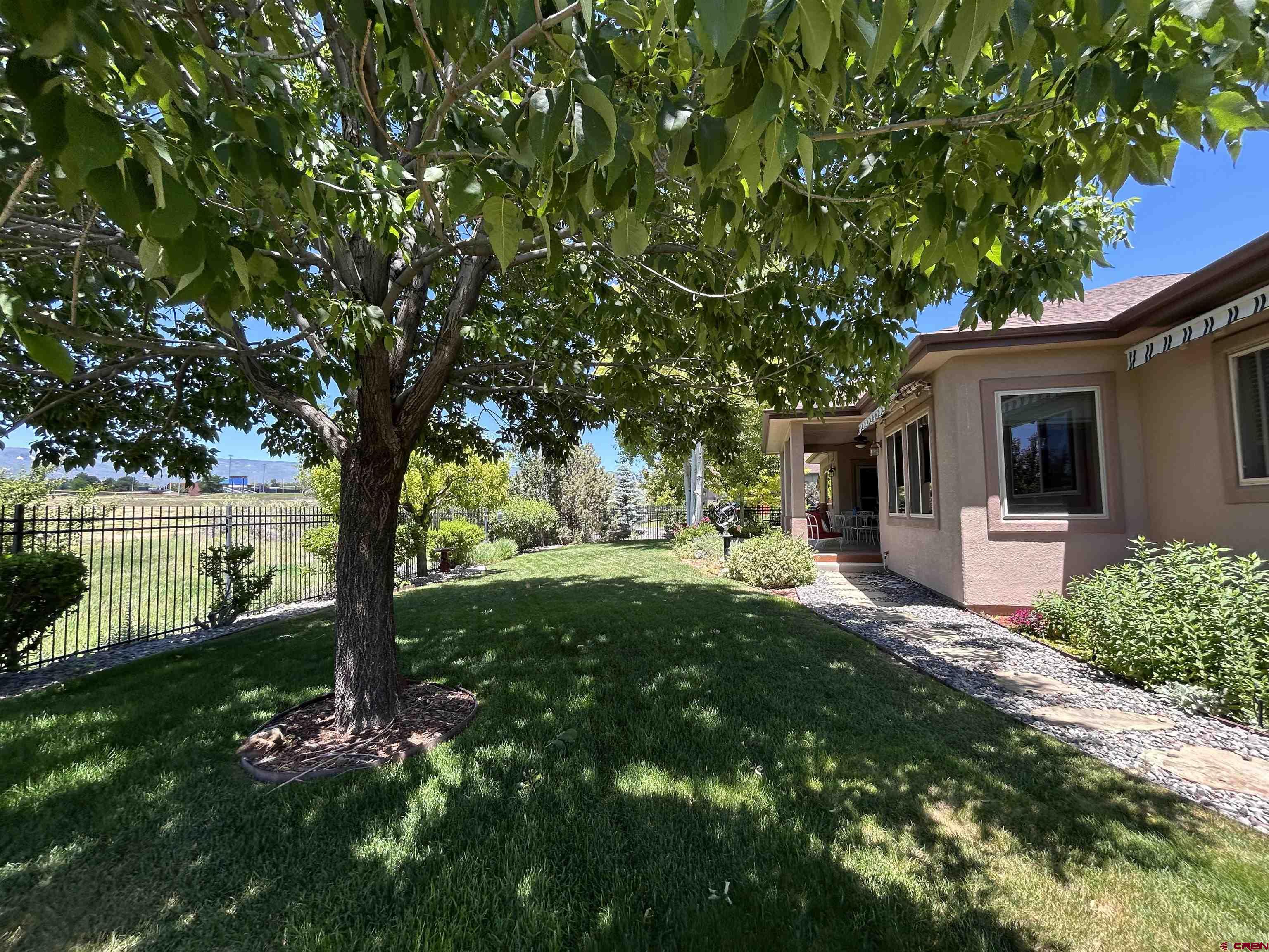 850 Southeast Pinyon Street Cedaredge, CO 81413 - Photo 33 of 45 a front view of a house with garden