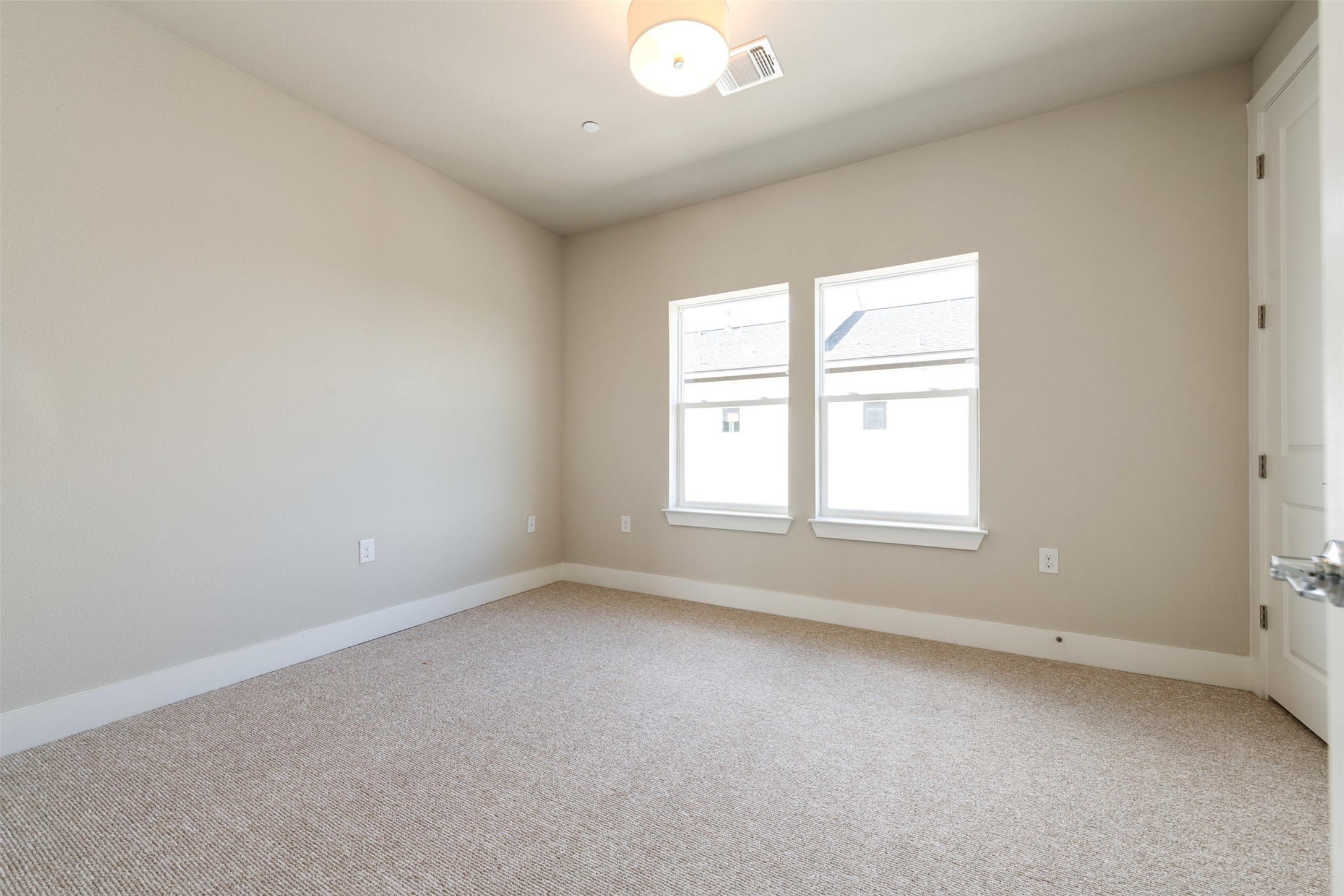 1308 Tinnin Ford Road, Unit 1 Austin, TX 78741 - Photo 12 of 21 an empty room with a window
