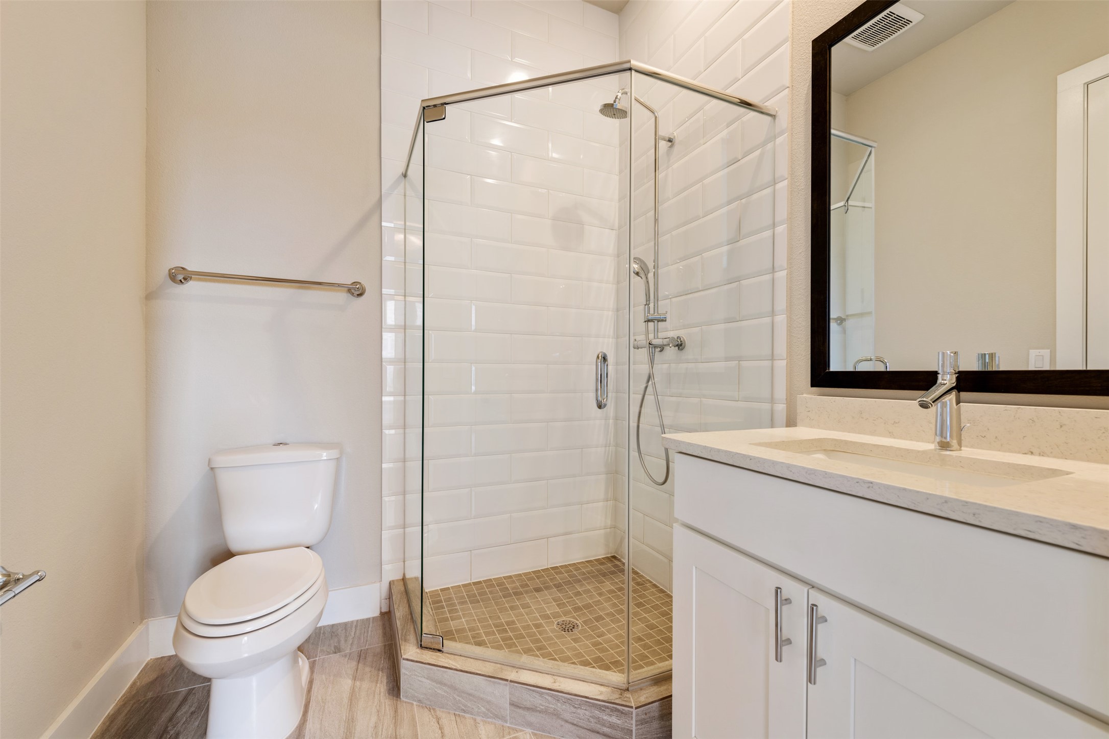 1308 Tinnin Ford Road, Unit 1 Austin, TX 78741 - Photo 14 of 21 a bathroom with a sink toilet and shower