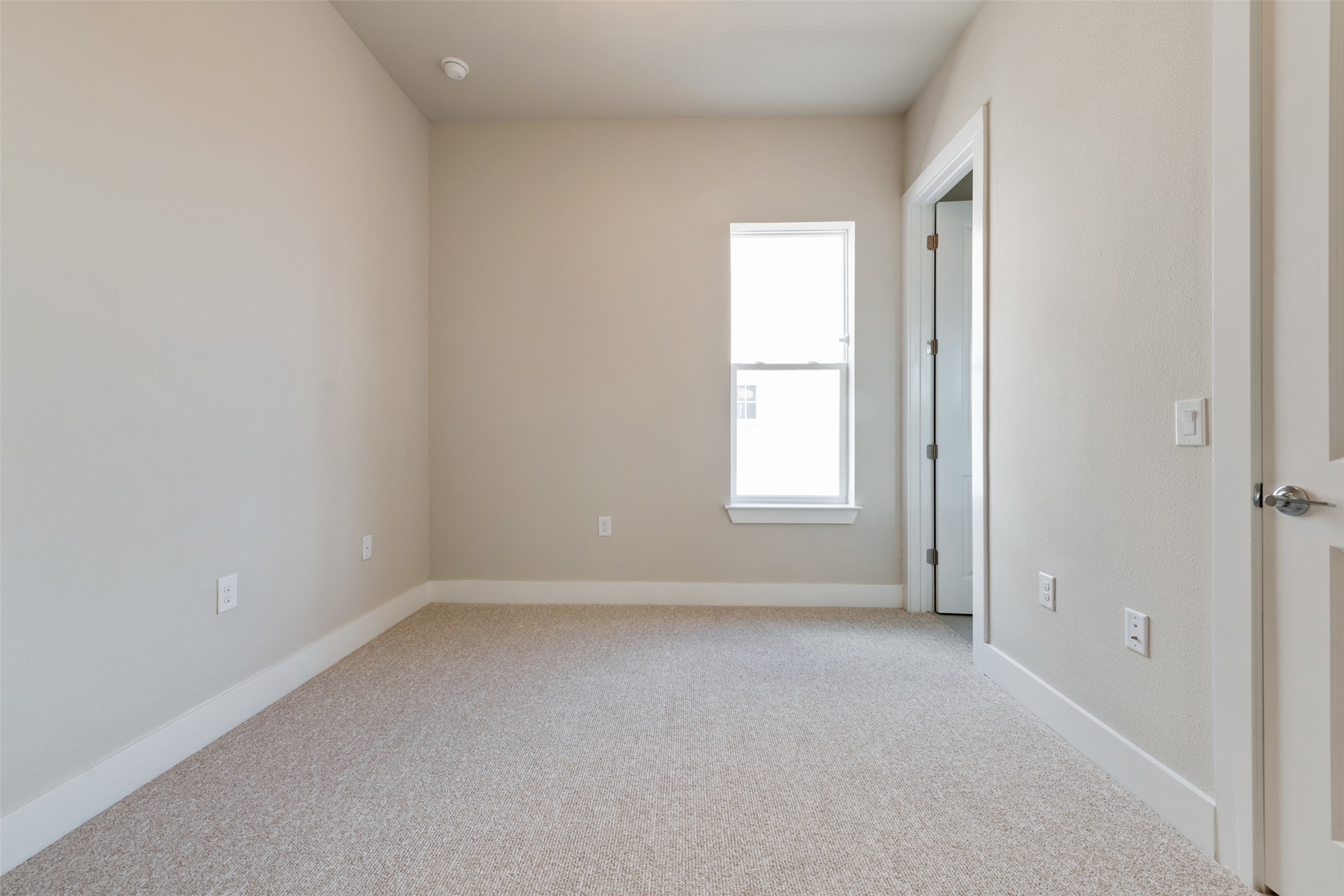1308 Tinnin Ford Road, Unit 1 Austin, TX 78741 - Photo 15 of 21 a view of empty room with window