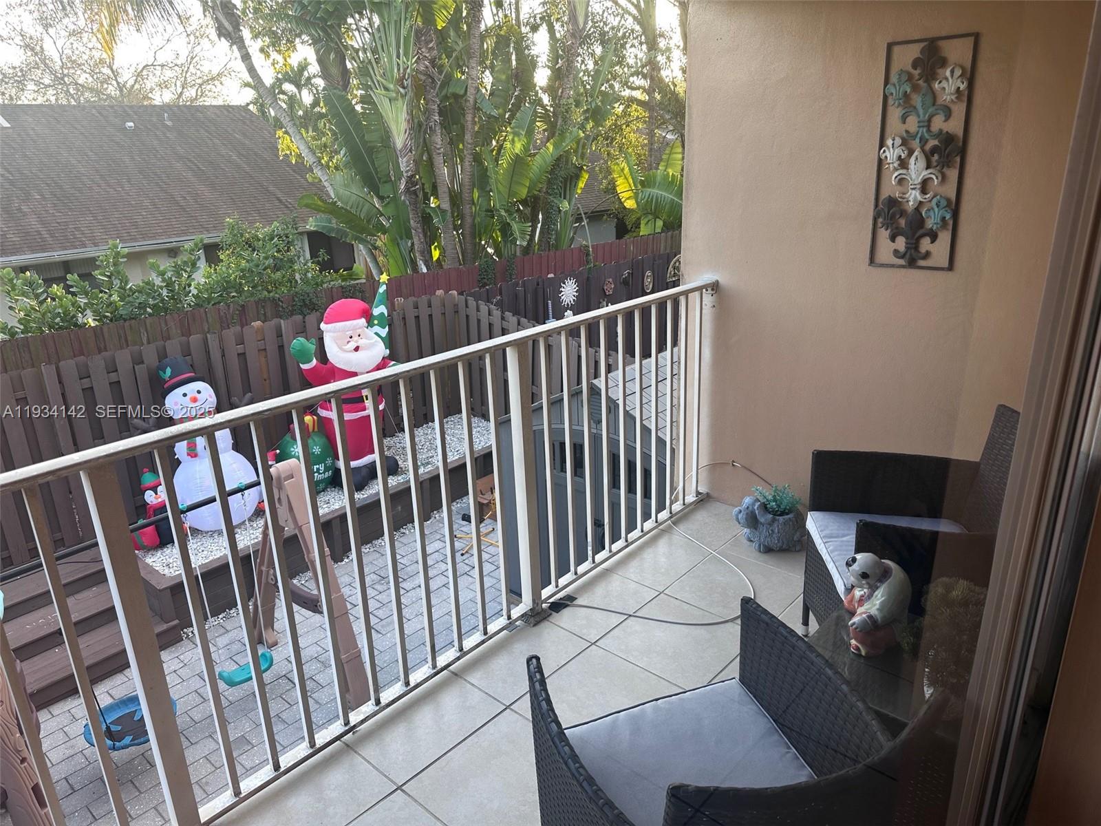9974 Southwest 88th Street, Unit 1028 Miami, FL 33176 - Photo 15 of 24 a view of balcony and deck