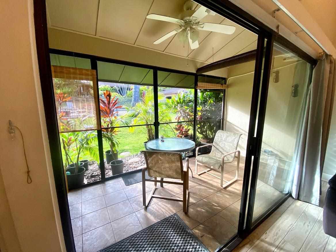 3788 Lower Honoapiilani Road, Unit F103 Lahaina, HI 96761 - Photo 9 of 25 a view of a porch with furniture and garden