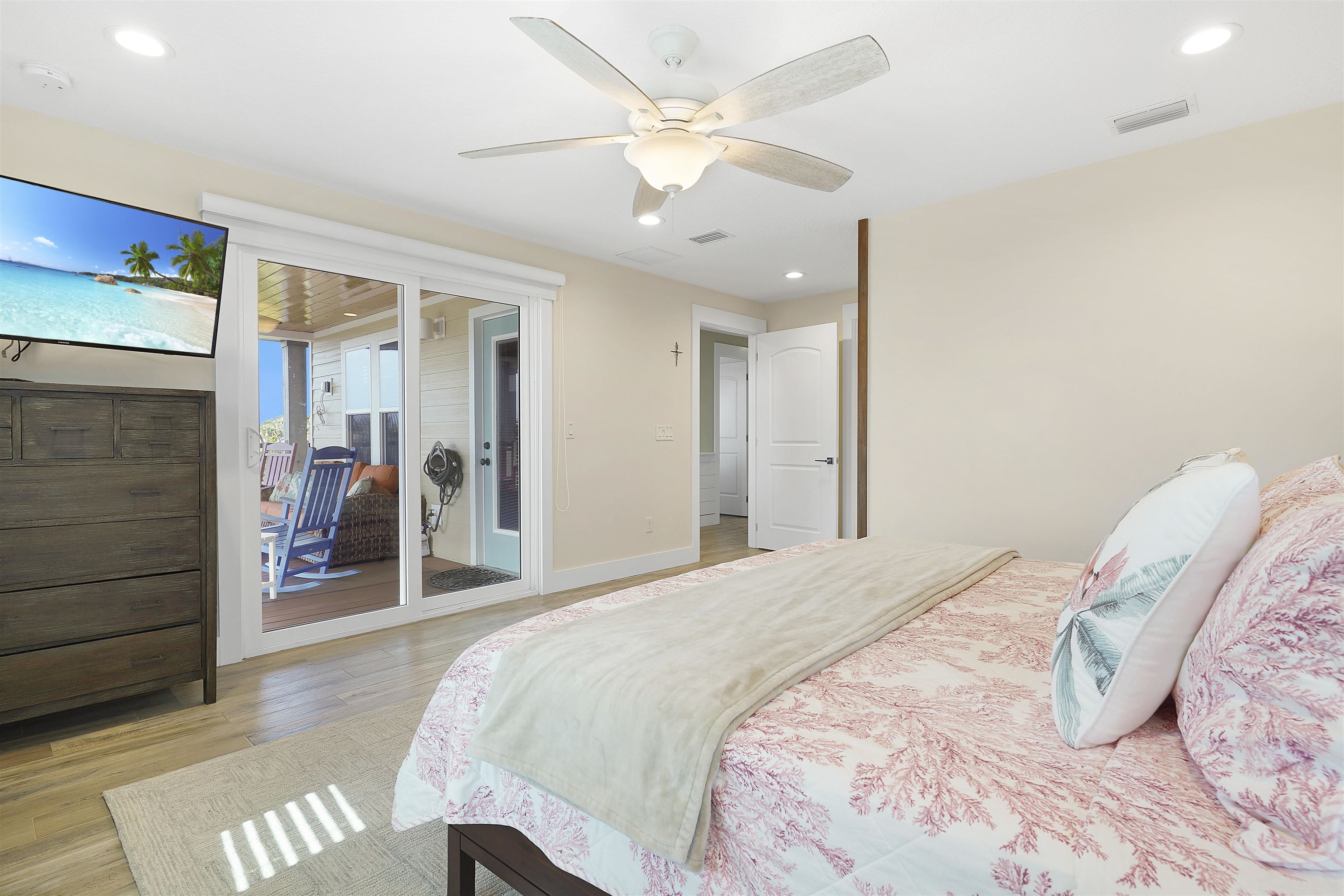 1 2nd Lane St. Augustine Beach, FL 32080 - Photo 24 of 81 a spacious bedroom with a bed and a walk in closet