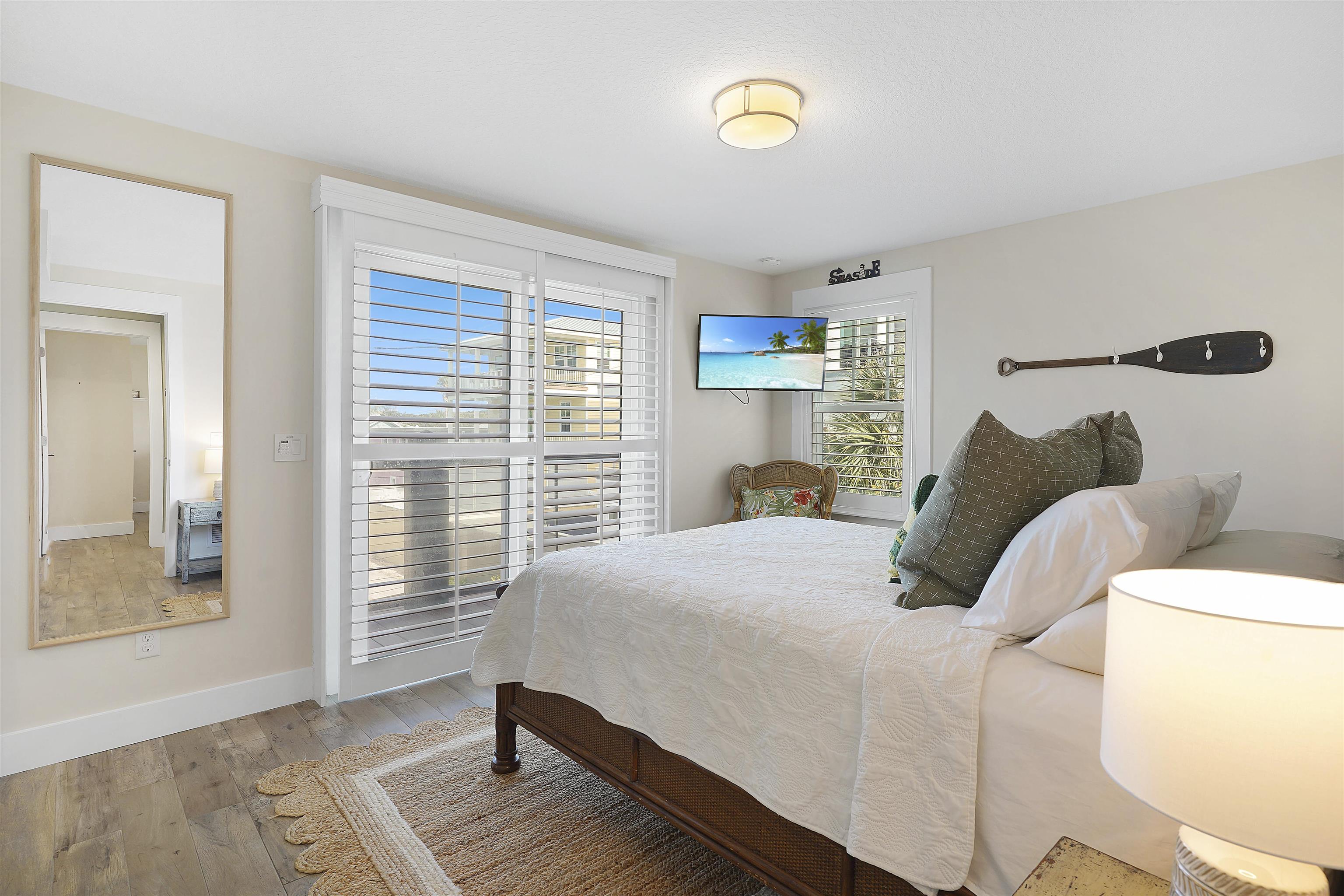 1 2nd Lane St. Augustine Beach, FL 32080 - Photo 34 of 81 a bedroom with a bed and a window
