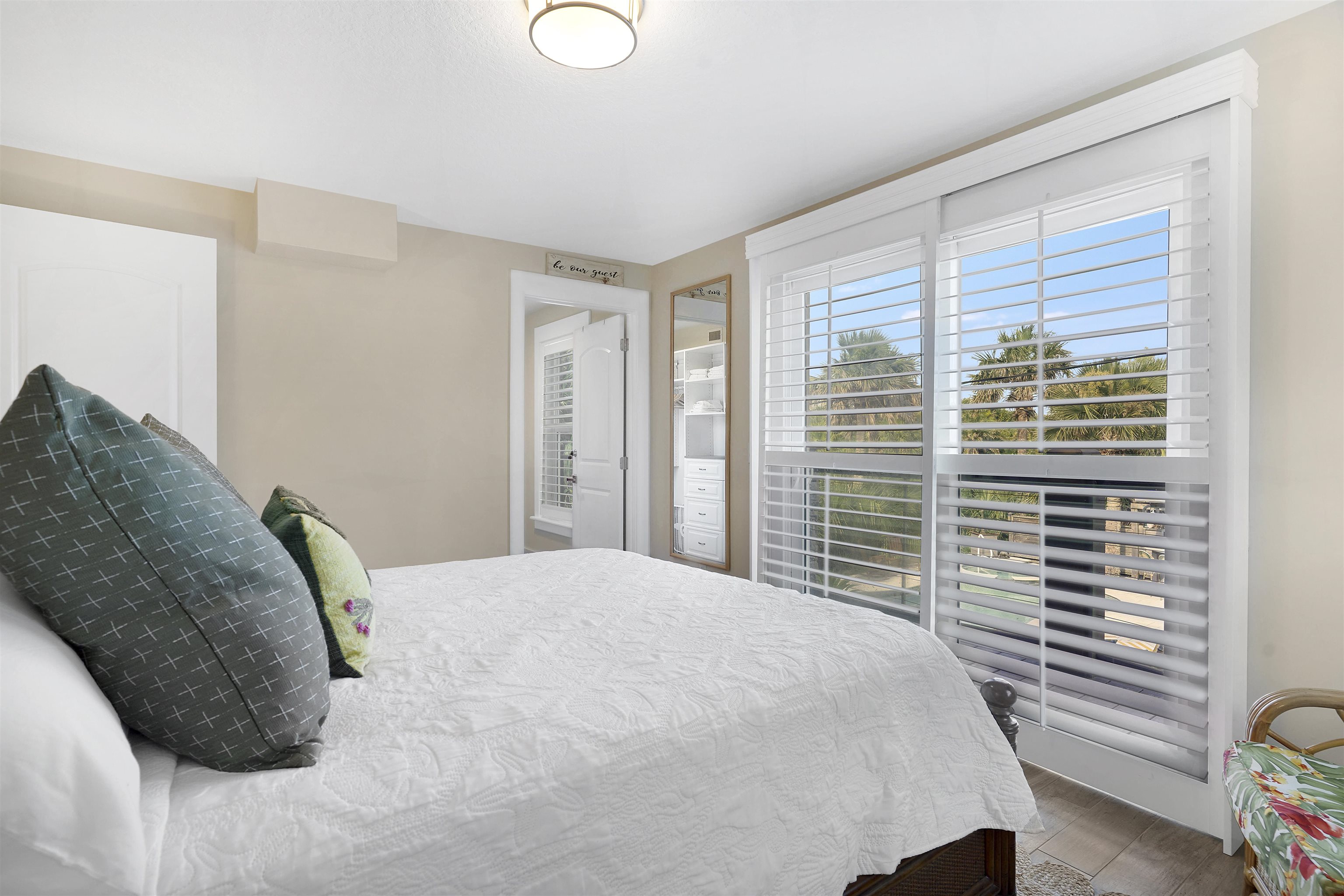 1 2nd Lane St. Augustine Beach, FL 32080 - Photo 35 of 81 a bedroom with a bed and a window