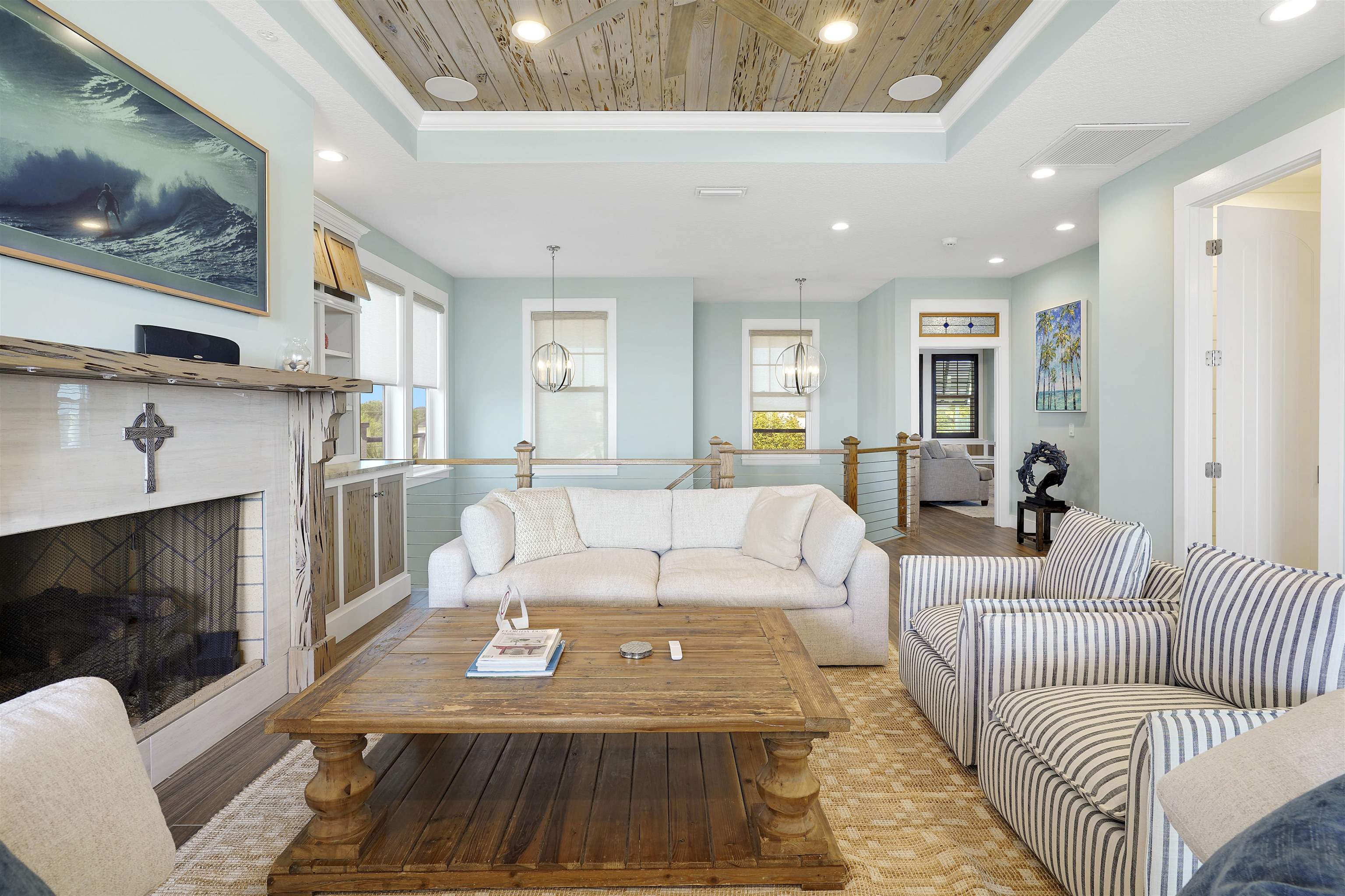 1 2nd Lane St. Augustine Beach, FL 32080 - Photo 42 of 81 a living room with furniture a flat screen tv and a fireplace
