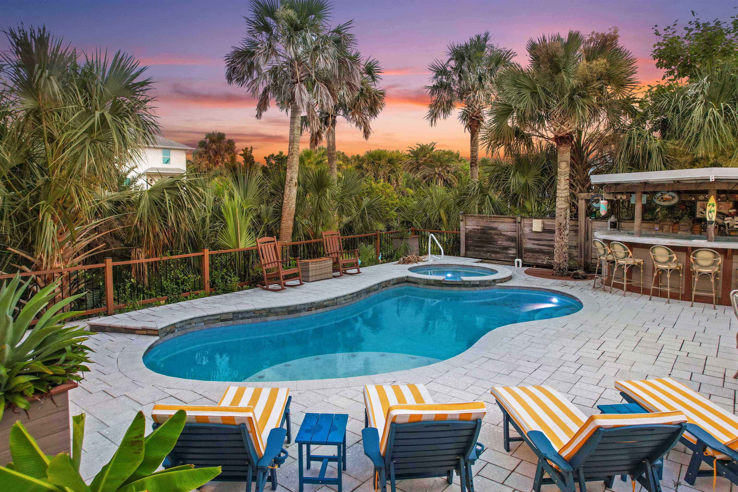 1 2nd Lane St. Augustine Beach, FL 32080 - Photo 63 of 81 a view of a swimming pool with a patio