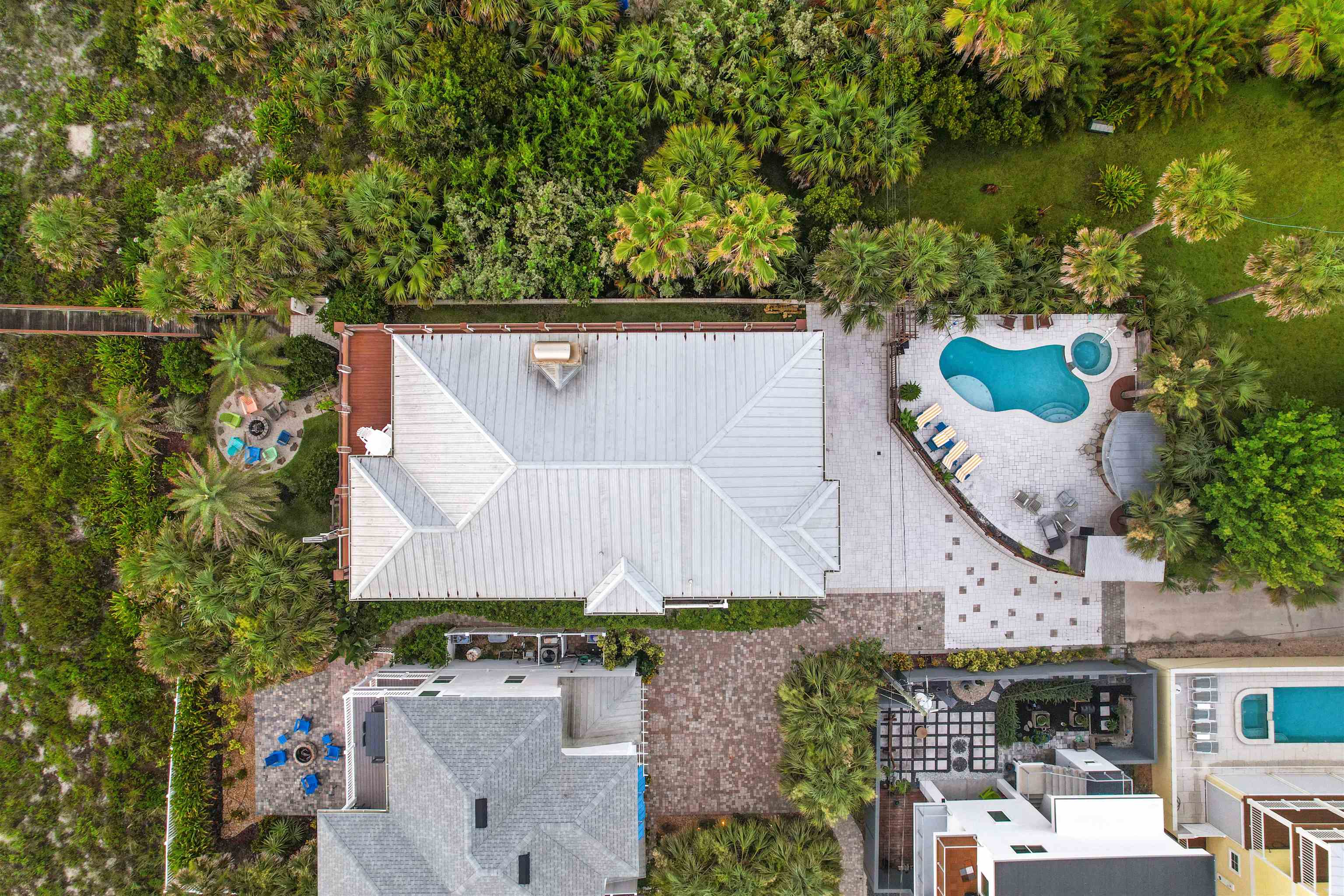 1 2nd Lane St. Augustine Beach, FL 32080 - Photo 75 of 81 an aerial view of a house with a garden and a yard