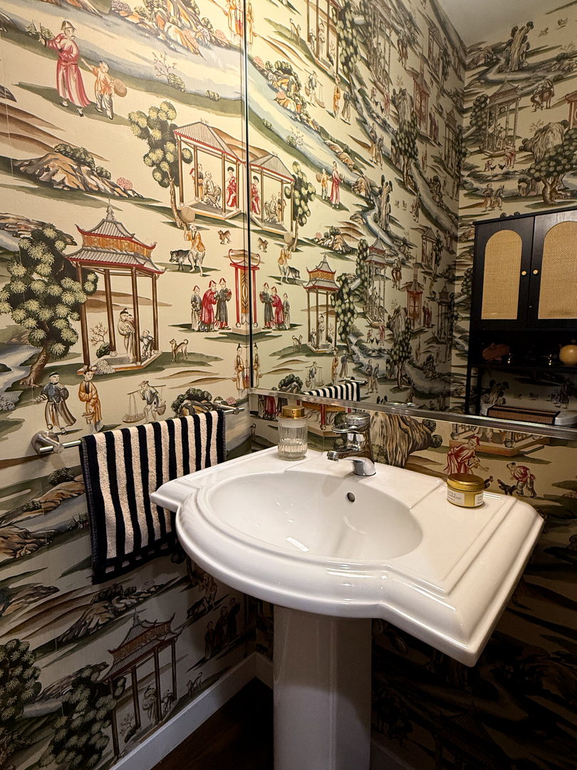 943 West Huron Street, Unit E Chicago, IL 60642 - Photo 20 of 22 a bathroom with a sink and a mirror