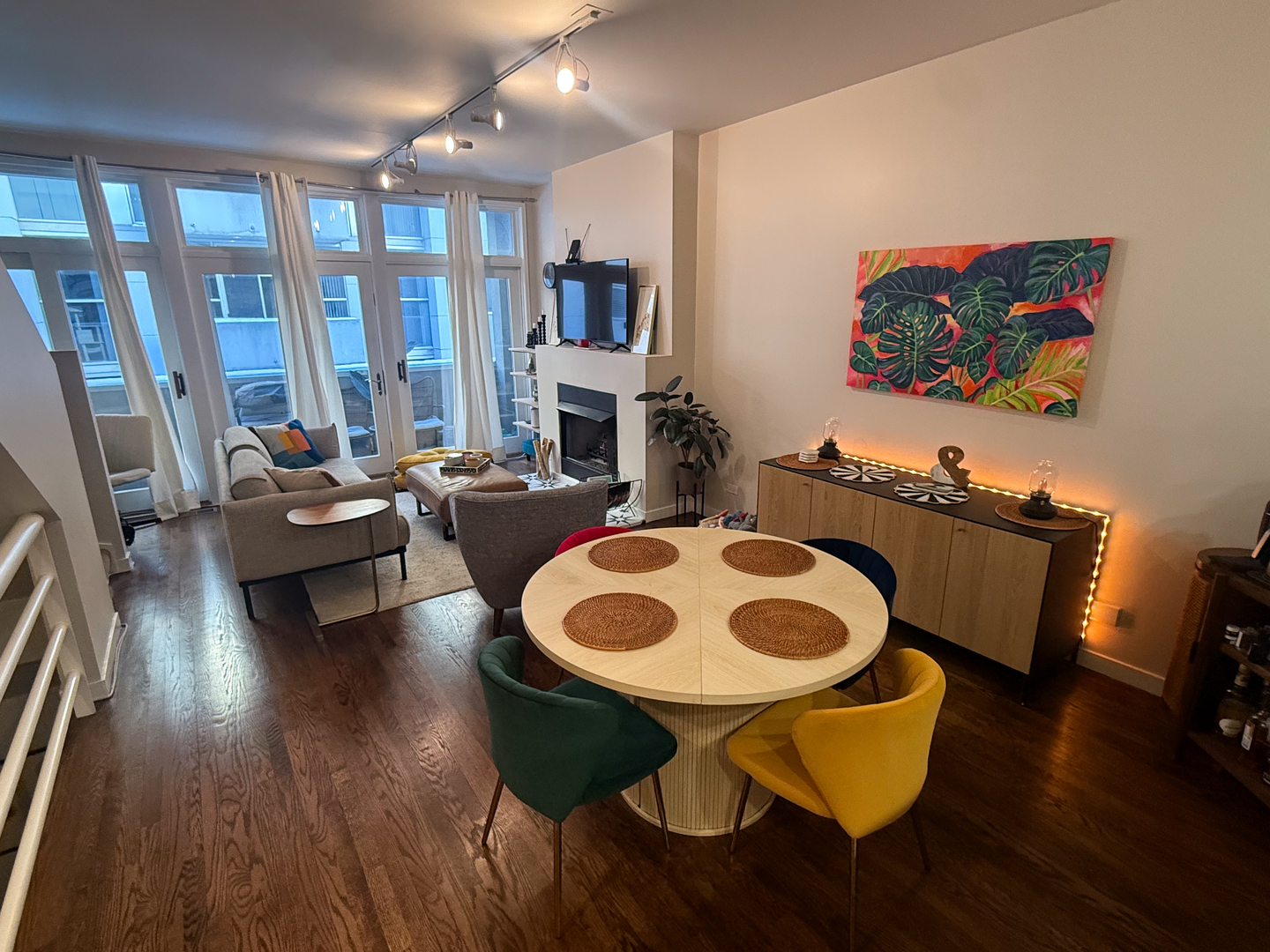 943 West Huron Street, Unit E Chicago, IL 60642 - Photo 9 of 22 a living room with furniture and a wooden floor