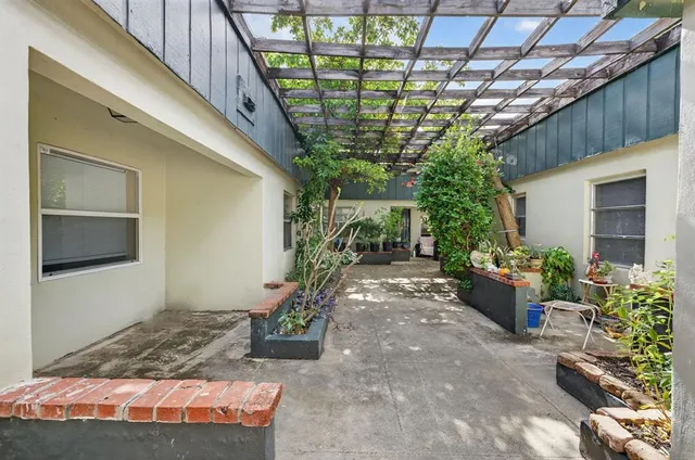 a view of a porch with furniture