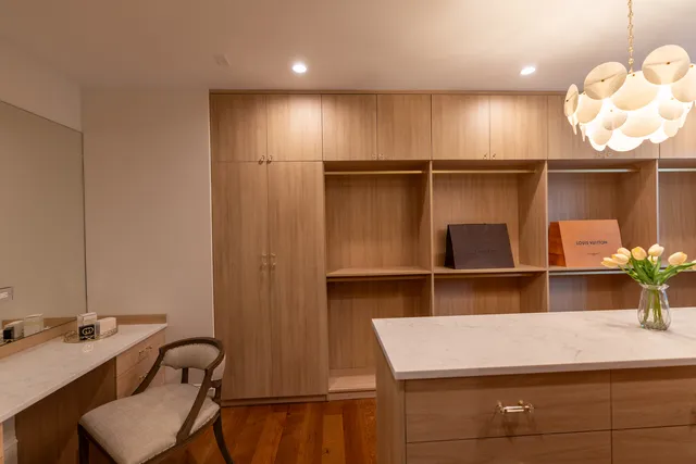 a bathroom with a bathtub a sink and a window