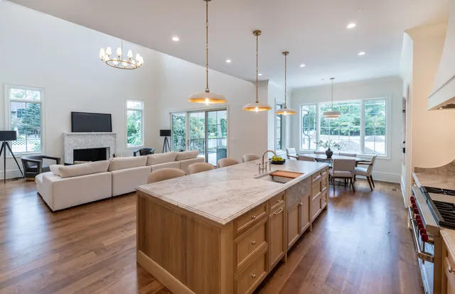 a kitchen with a refrigerator and cabinets