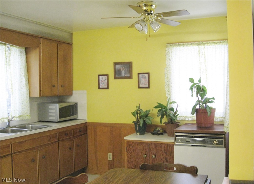 105 Trunko Road Akron, OH 44333 - Photo 8 of 21 Spacious Kitchen:16' x 9'. Nice size Eating Area. Portable dishwasher remains.