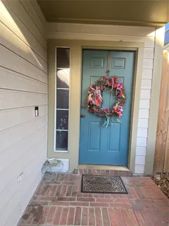 a view of a entryway door of the house