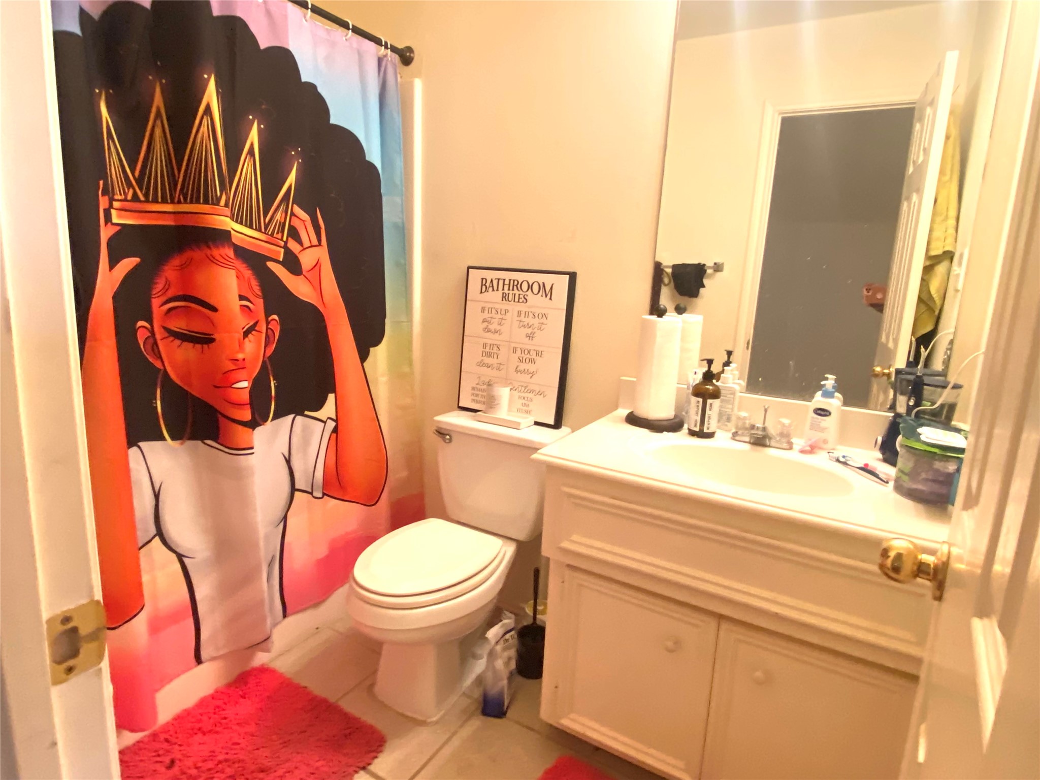 1718 Redwing Ridge Drive Houston, TX 77009 - Photo 12 of 32 a bathroom with a toilet sink and mirror