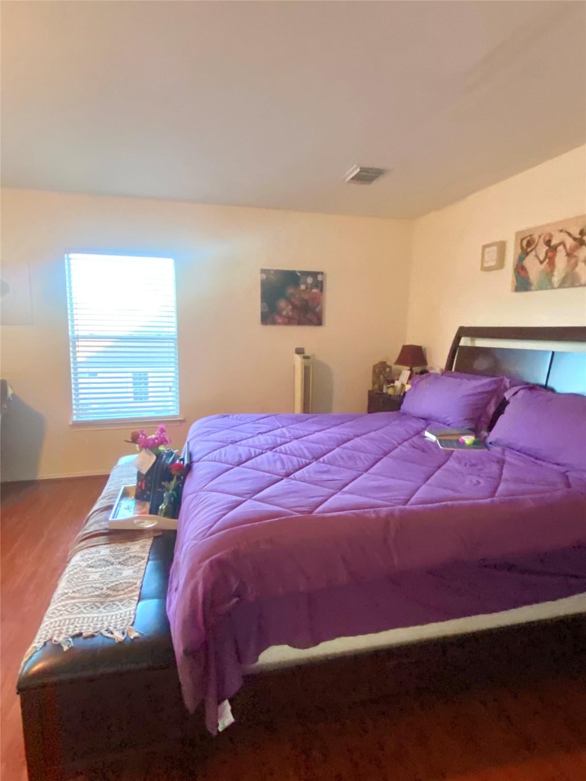 1718 Redwing Ridge Drive Houston, TX 77009 - Photo 13 of 32 a bedroom with a bed and a window