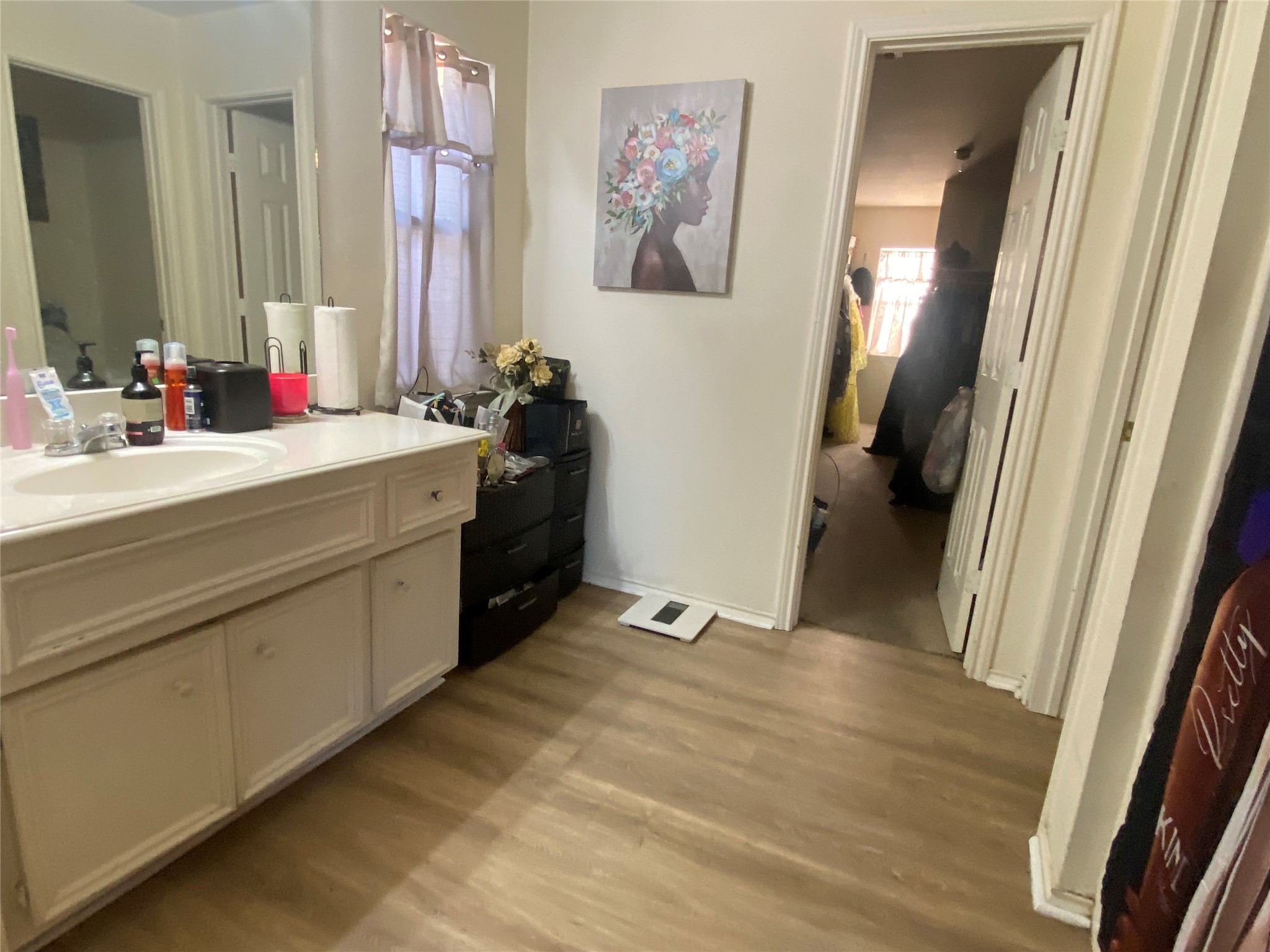 1718 Redwing Ridge Drive Houston, TX 77009 - Photo 16 of 32 a bathroom with a sink and a mirror