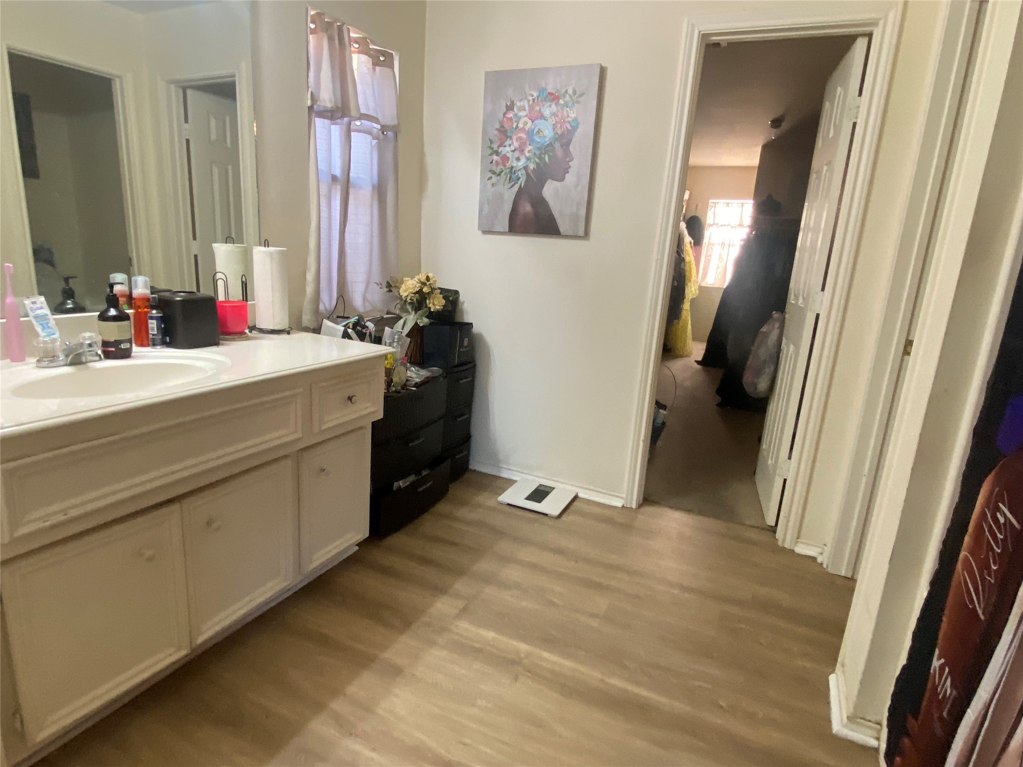 1718 Redwing Ridge Drive Houston, TX 77009 - Photo 16 of 32 a bathroom with a sink and a mirror