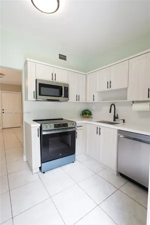 $455,000 | 2310 West Bunche Park Drive, Miami Gardens, FL 33054