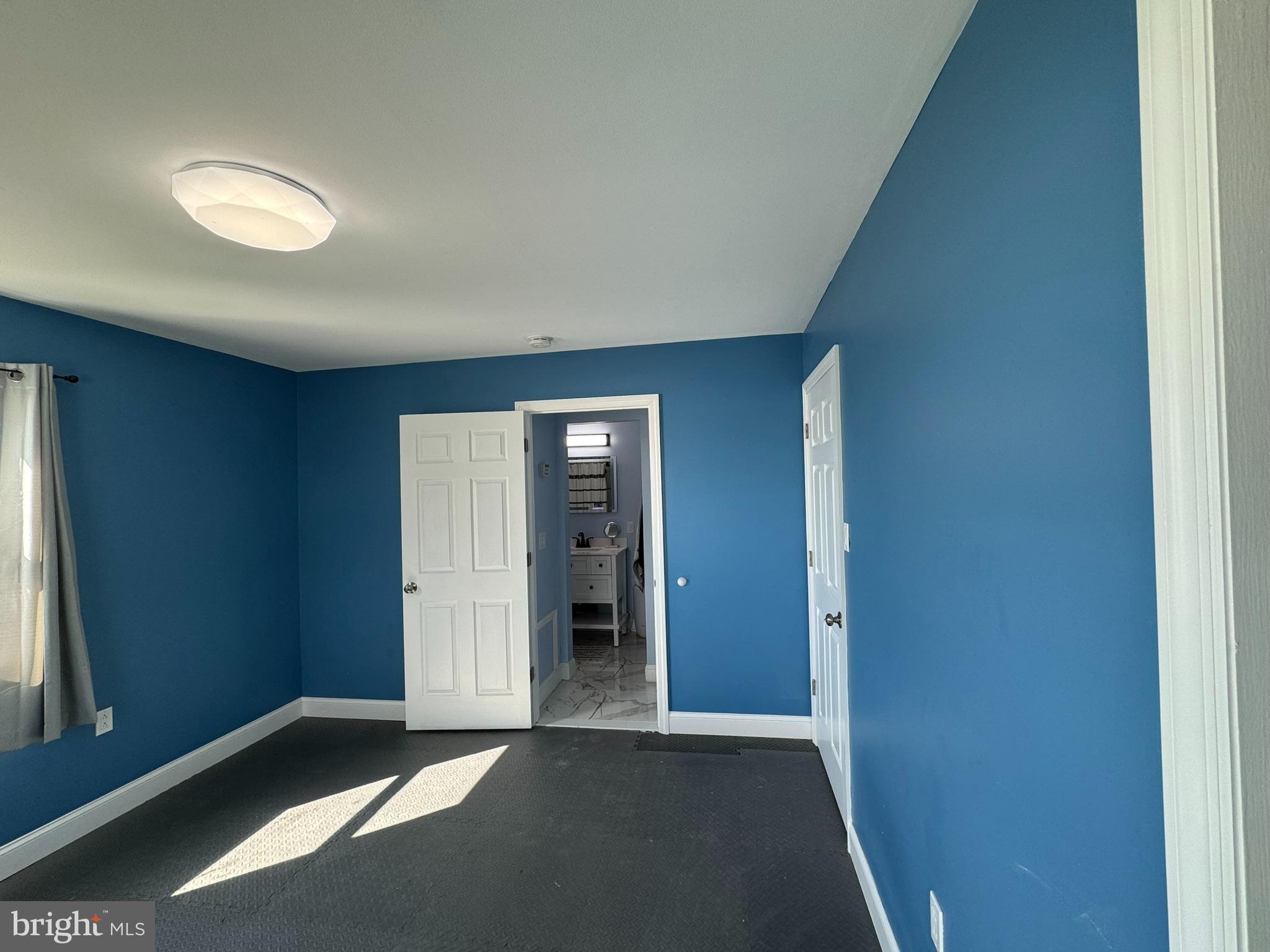 49 Delaware Drive Penns Grove, NJ 08069 - Photo 10 of 26 an empty room with windows