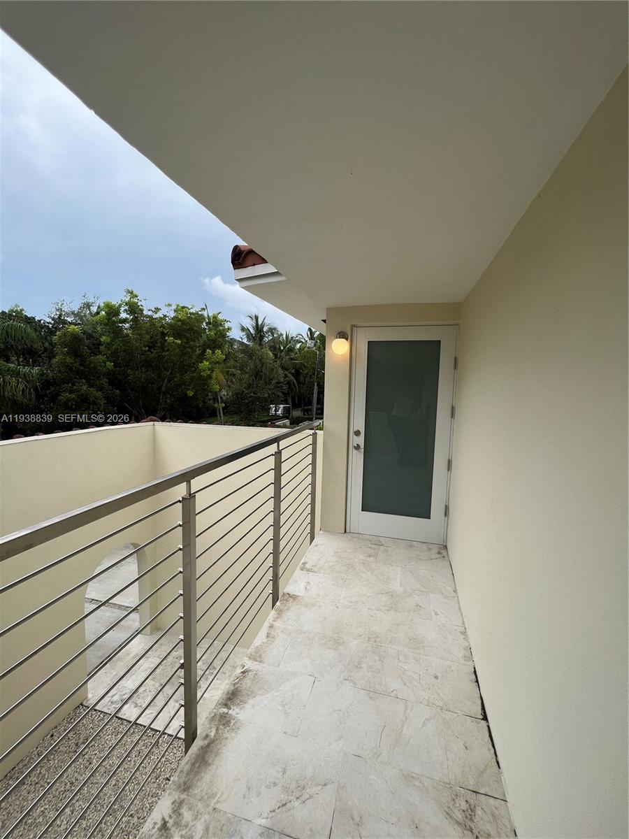 9210 Southwest 73rd Avrd, Unit 9210 Pinecrest, FL 33156 - Photo 3 of 18 a view of a terrace