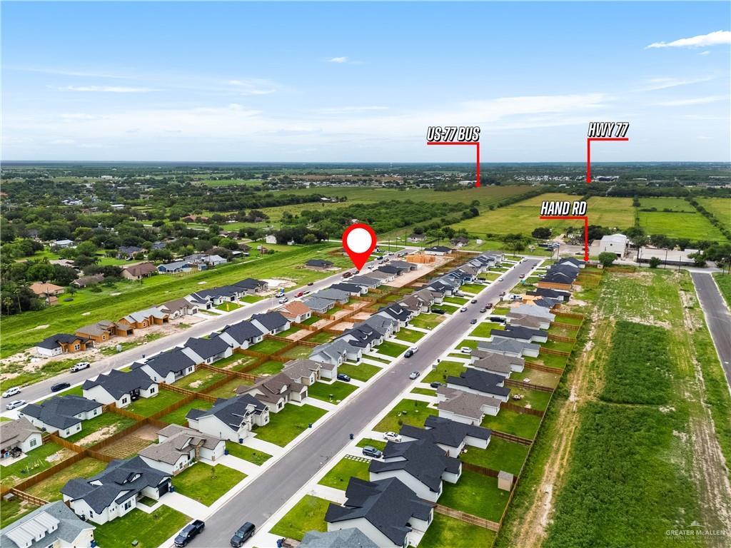 18054 Spruce Street Combes, TX 78552 - Photo 22 of 25 Aerial perspective showcasing a developing residential community