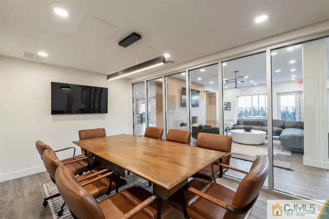 a kitchen with a large window and a table in it