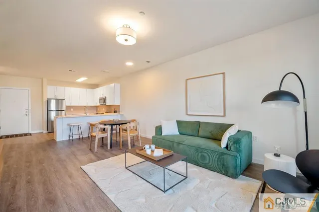 a kitchen with a table and chairs in it