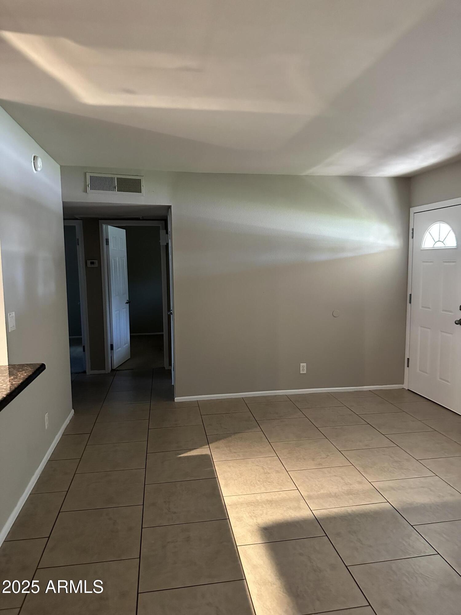 2525 South College Avenue, Unit 2 Tempe, AZ 85282 - Photo 9 of 13 a view of hallway with a bathroom