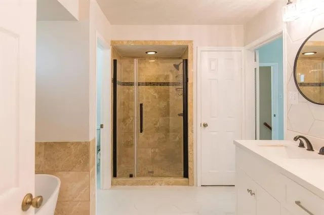 a bathroom with a white tub