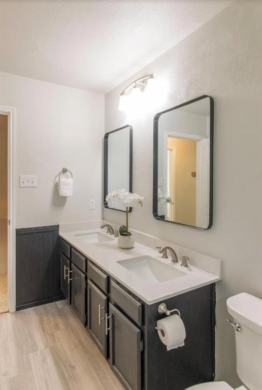 4013 18th Street Plano, TX 75074 - Photo 29 of 39 a bathroom with a sink and a mirror