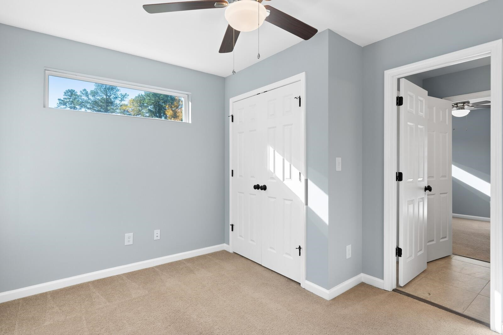 129 Pineland Circle, Unit 100 Raleigh, NC 27606 - Photo 13 of 29 wooden floor in an empty room