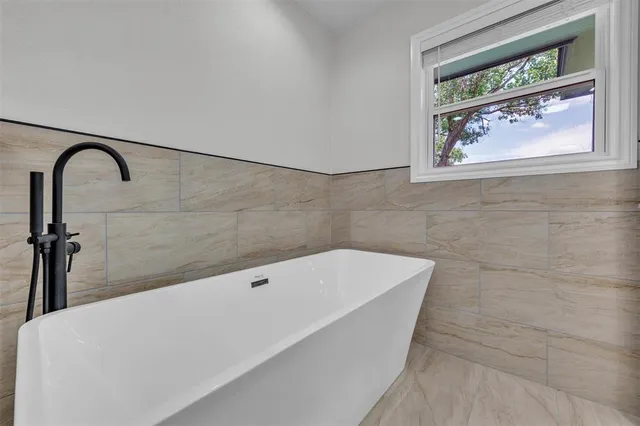 a bathroom with a bathtub