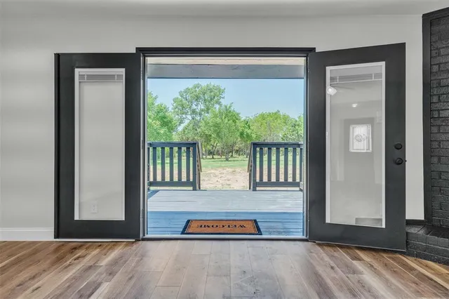 a view of front door and deck