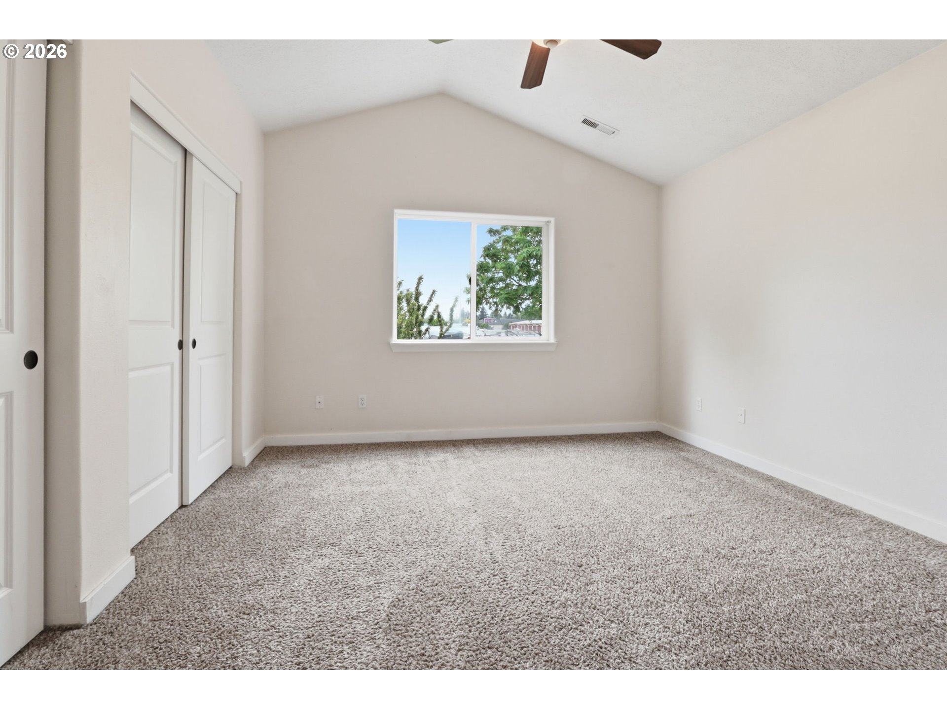 581 Southeast 204th Place Gresham, OR 97030 - Photo 15 of 32 a view of an empty room with a window