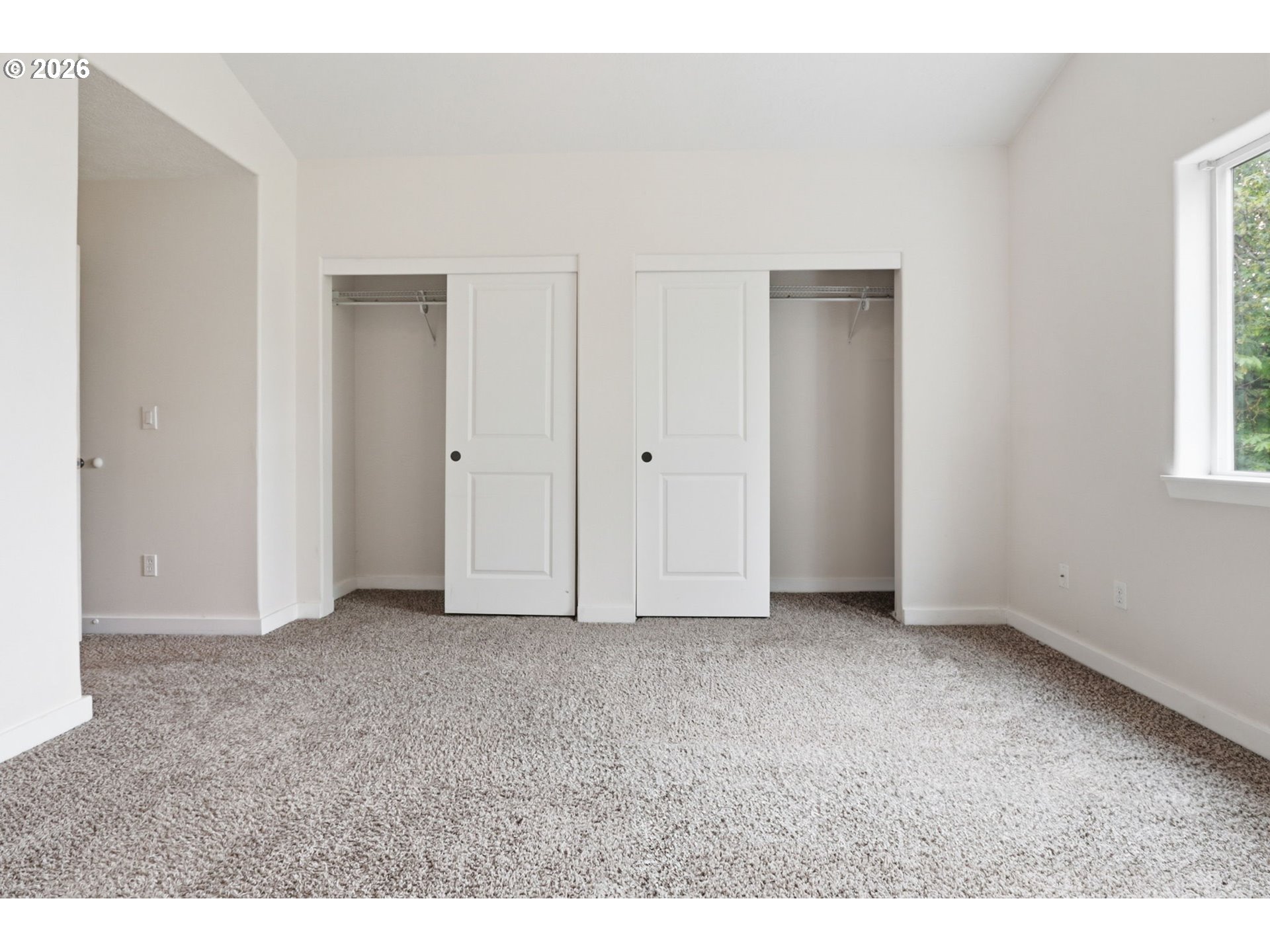 581 Southeast 204th Place Gresham, OR 97030 - Photo 16 of 32 a view of an empty room with a window