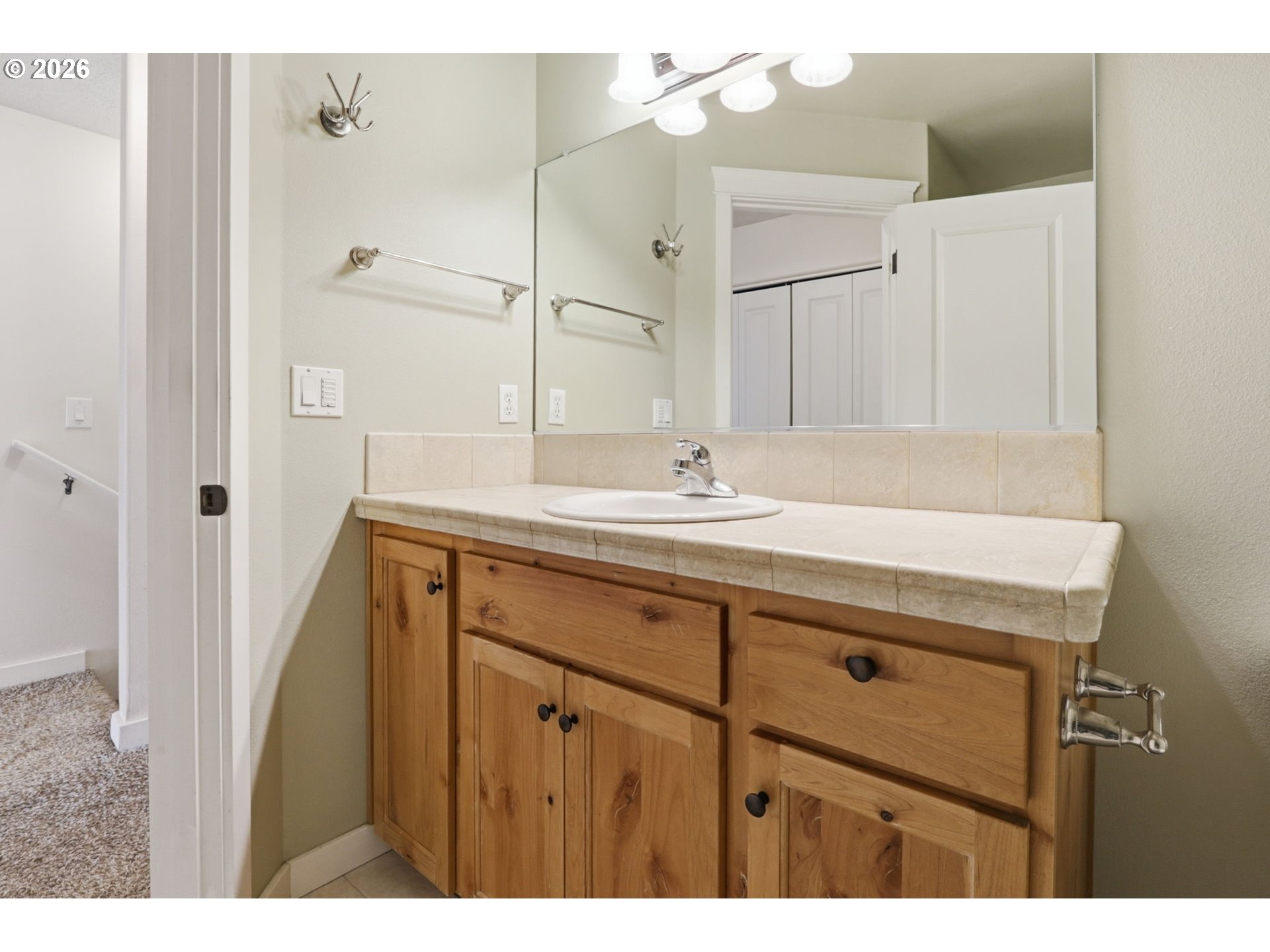 581 Southeast 204th Place Gresham, OR 97030 - Photo 19 of 32 a bathroom with a sink mirror and double