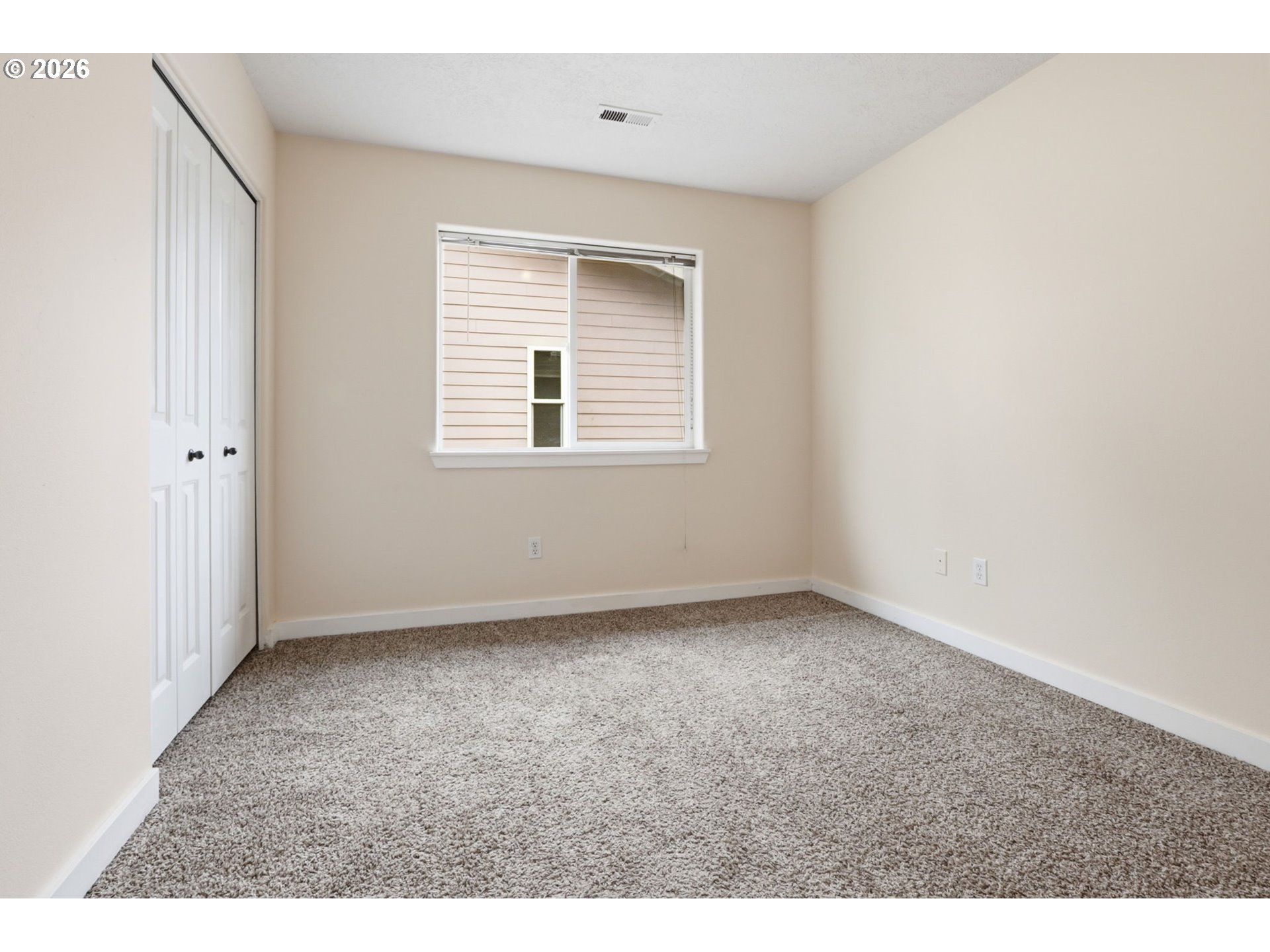 581 Southeast 204th Place Gresham, OR 97030 - Photo 23 of 32 an empty room with a window