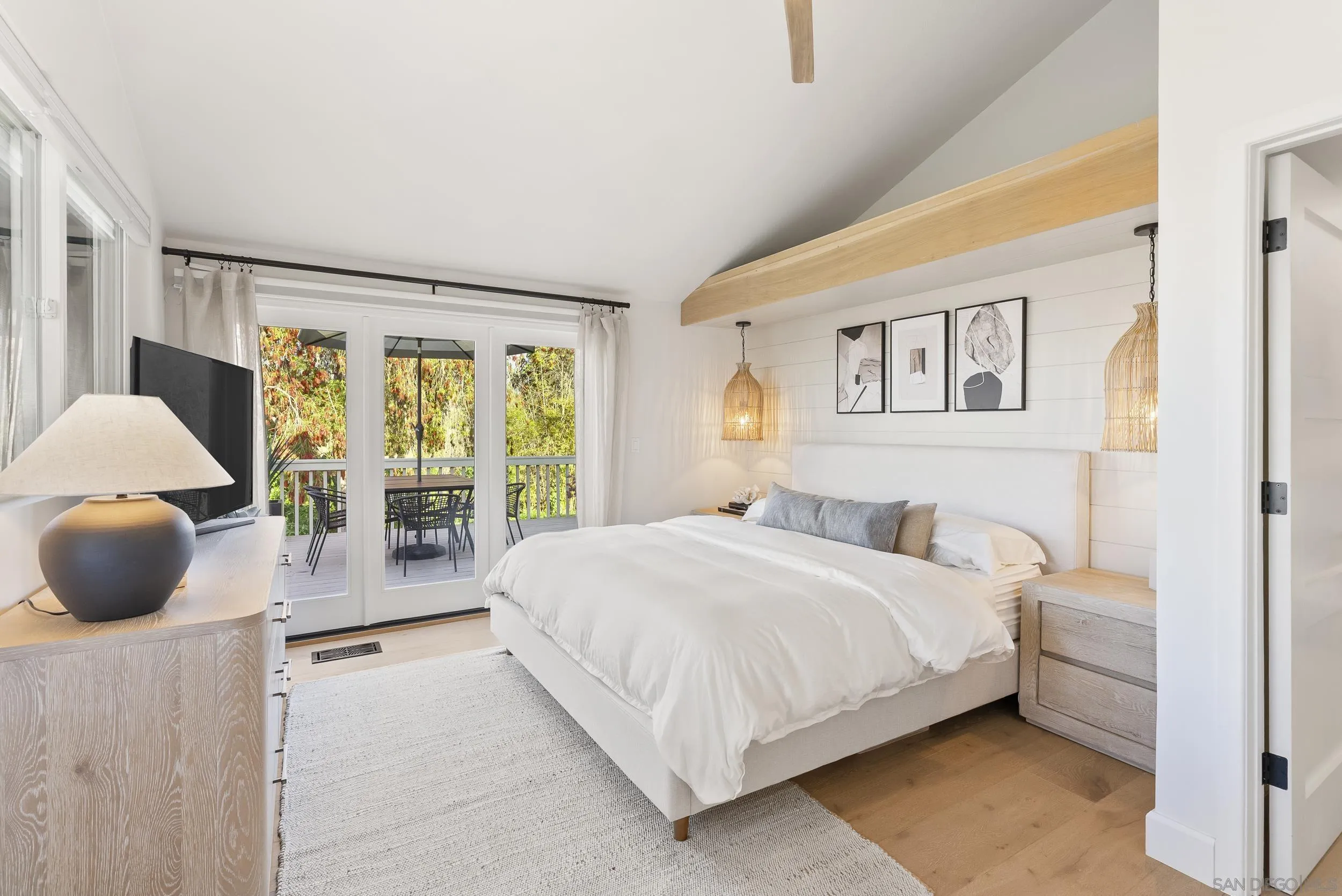 1873 Haymarket Road Encinitas, CA 92024 - Photo 6 of 16 a bedroom with a large bed and a large window