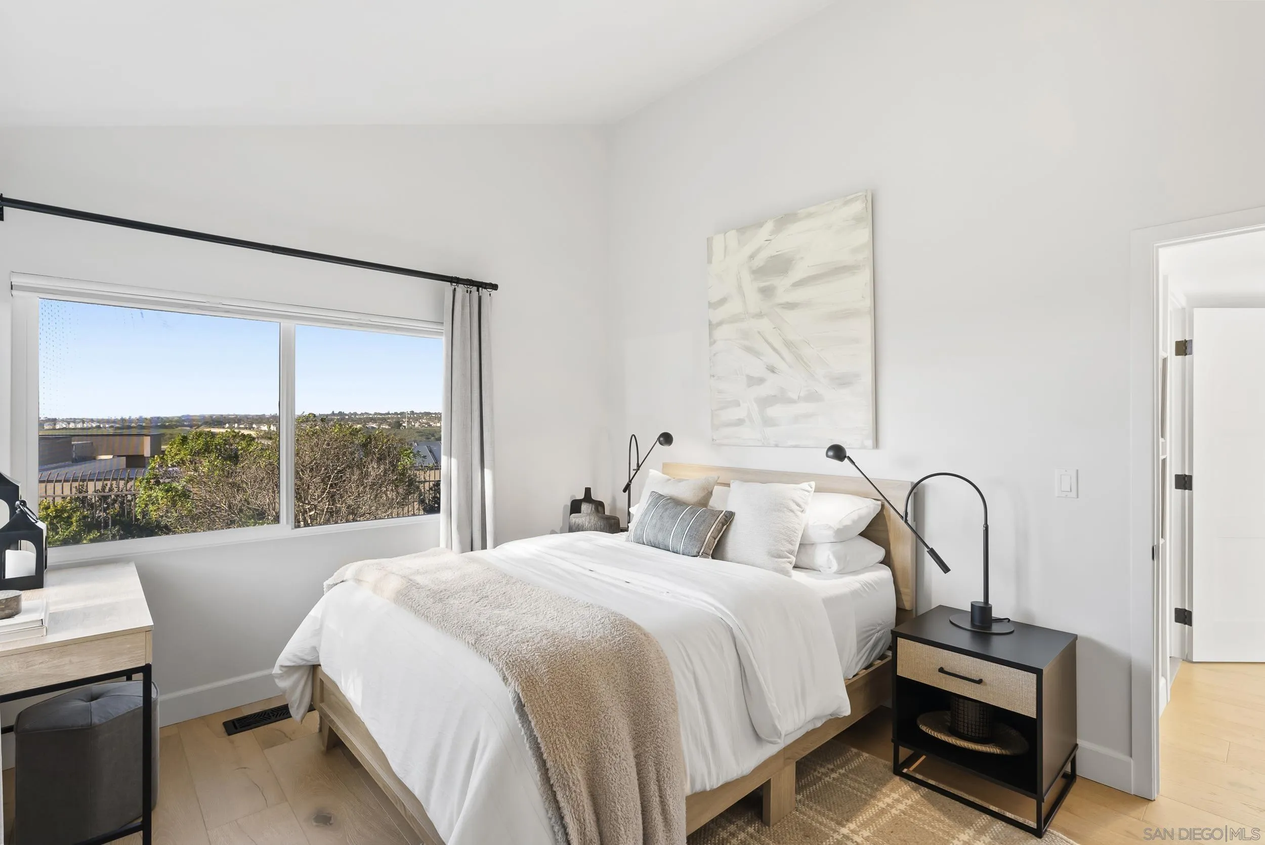 1873 Haymarket Road Encinitas, CA 92024 - Photo 8 of 16 a bedroom with a bed and a large window