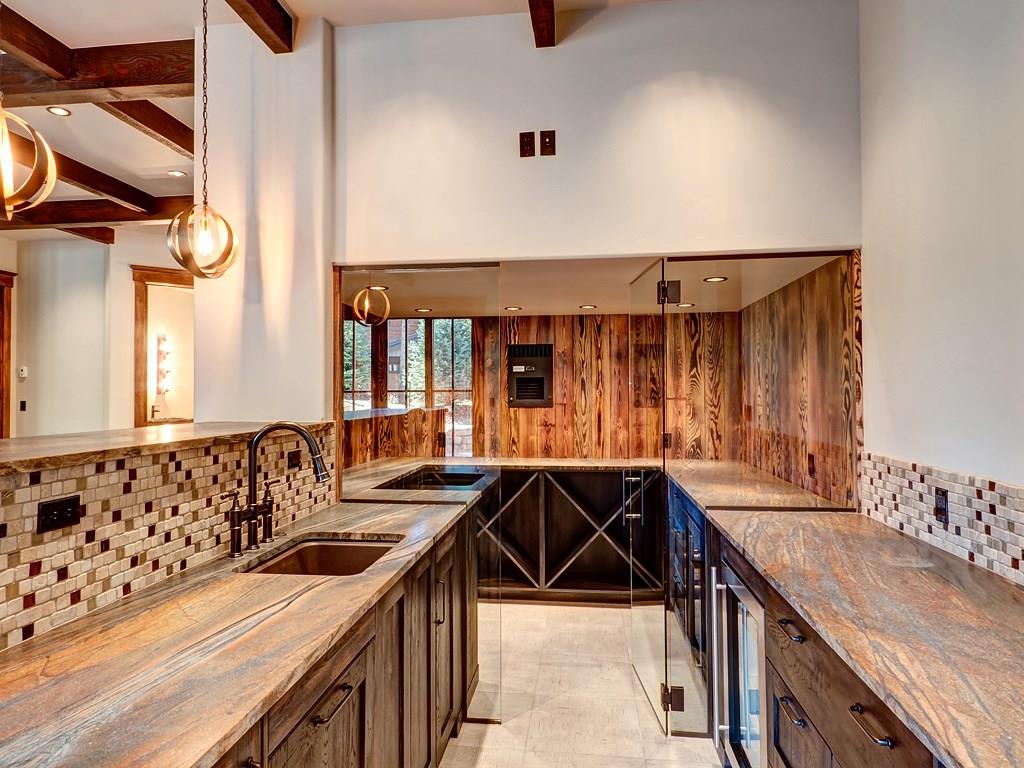 314 Peerless Drive Breckenridge, CO 80424 - Photo 13 of 25 a kitchen with a sink and a stove top oven