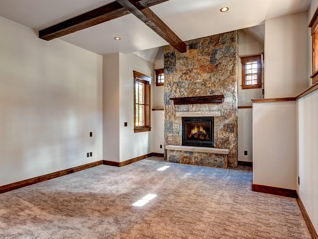 314 Peerless Drive Breckenridge, CO 80424 - Photo 14 of 25 a view of an empty room with window and fire place