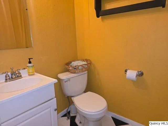a bathroom with a sink and a toilet