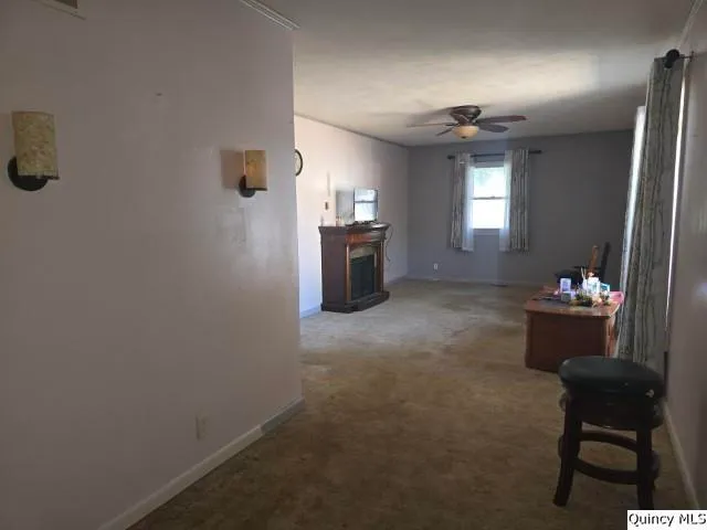 a room with furniture and window