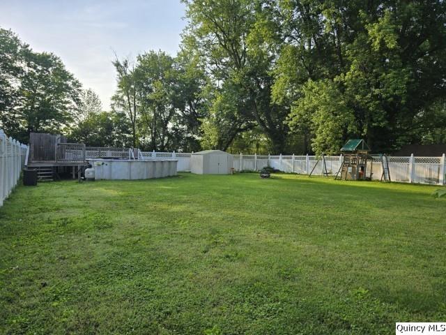 705 South Washington Street Carthage, IL 62321 - Photo 24 of 27 a view of a backyard with a garden