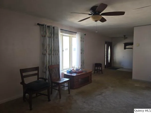 a room with furniture and window