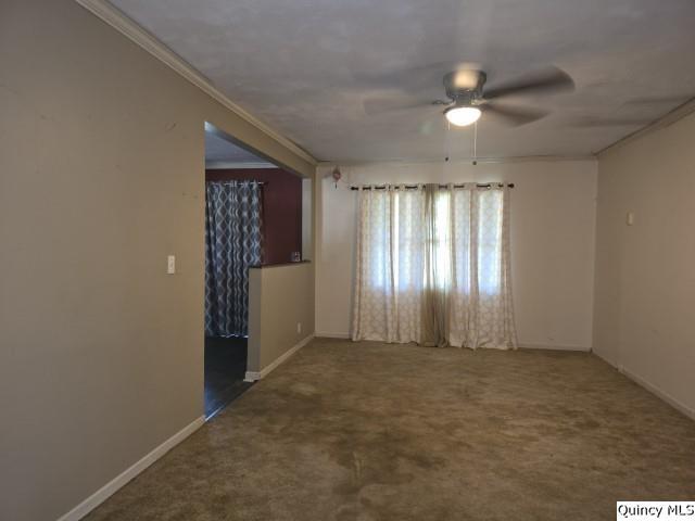 705 South Washington Street Carthage, IL 62321 - Photo 4 of 27 an empty room with closet and windows
